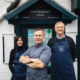 Andy and Janet Batty standing outside The front of The Steakist with Michael Lyons.