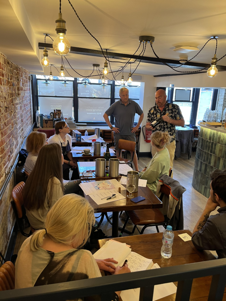 Staff being trained about the wine.